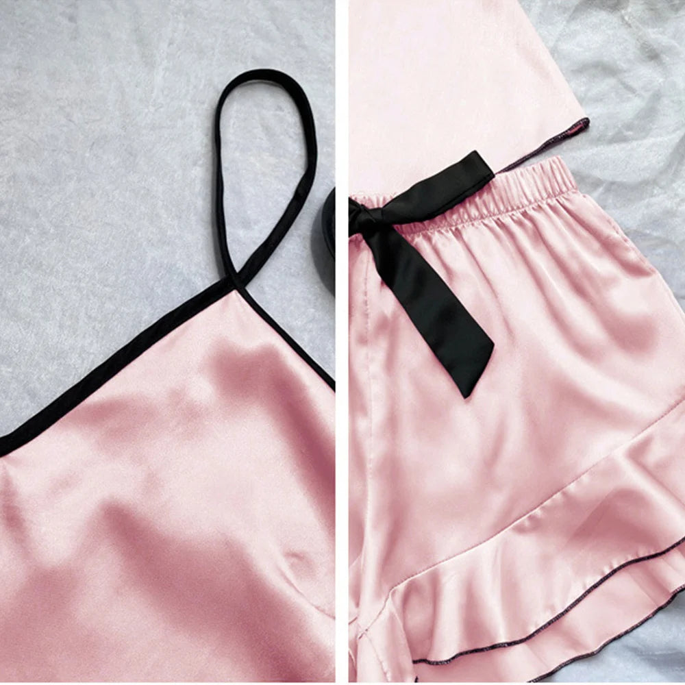 Pigiama da donna in raso liscio T-shirt con scollo a V Bordi arruffati e pantaloncini con fiocco Set di pigiama semplice e traspirante