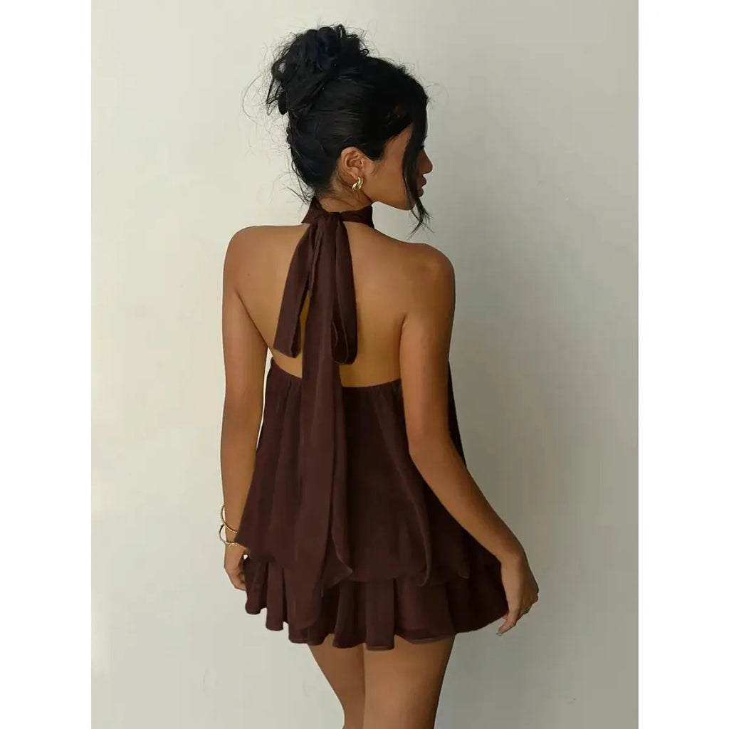 Abito da donna con collo all’americana, minigonna in chiffon senza schienale