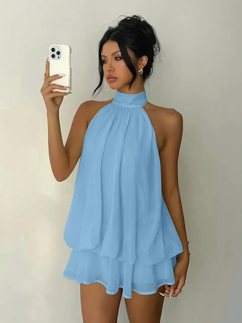 Abito da donna con collo all’americana, minigonna in chiffon senza schienale