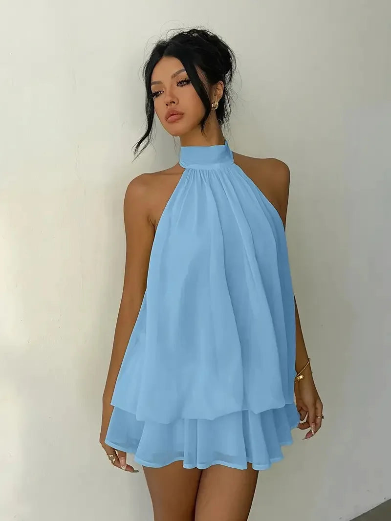 Abito da donna con collo all’americana, minigonna in chiffon senza schienale