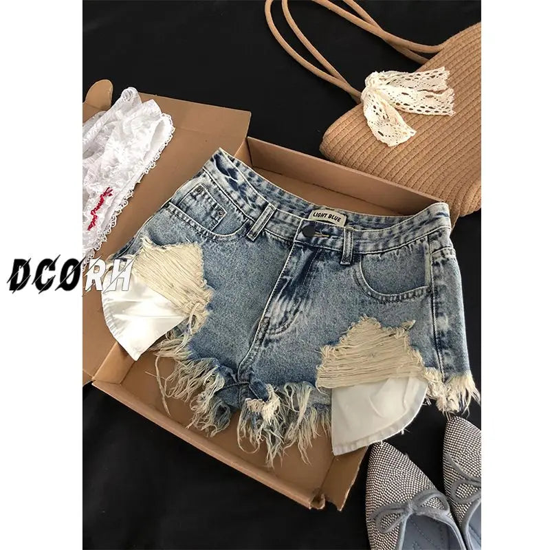 Pantaloncini di jeans strappati Tasche retrò da donna
