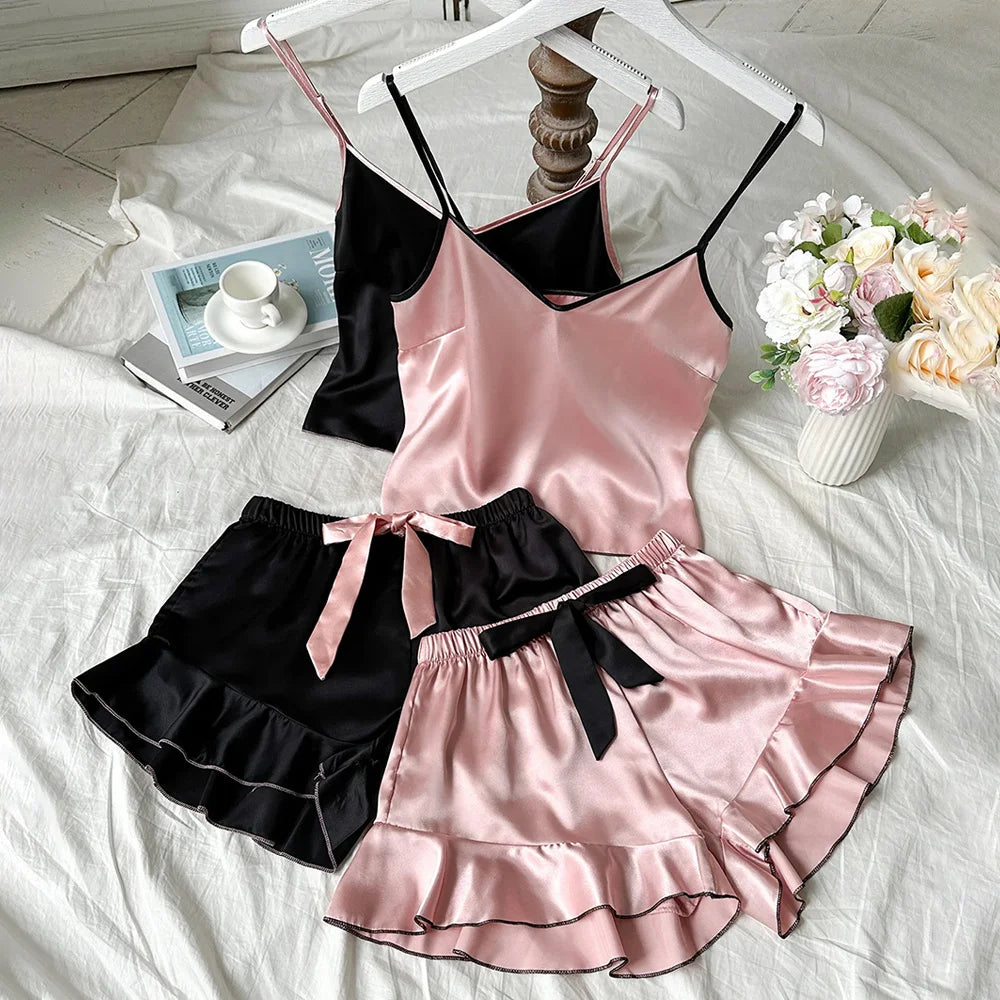 Pigiama da donna in raso liscio T-shirt con scollo a V Bordi arruffati e pantaloncini con fiocco Set di pigiama semplice e traspirante