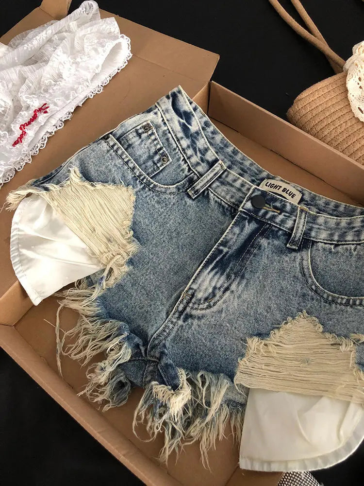 Pantaloncini di jeans strappati Tasche retrò da donna