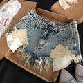Pantaloncini di jeans strappati Tasche retrò da donna