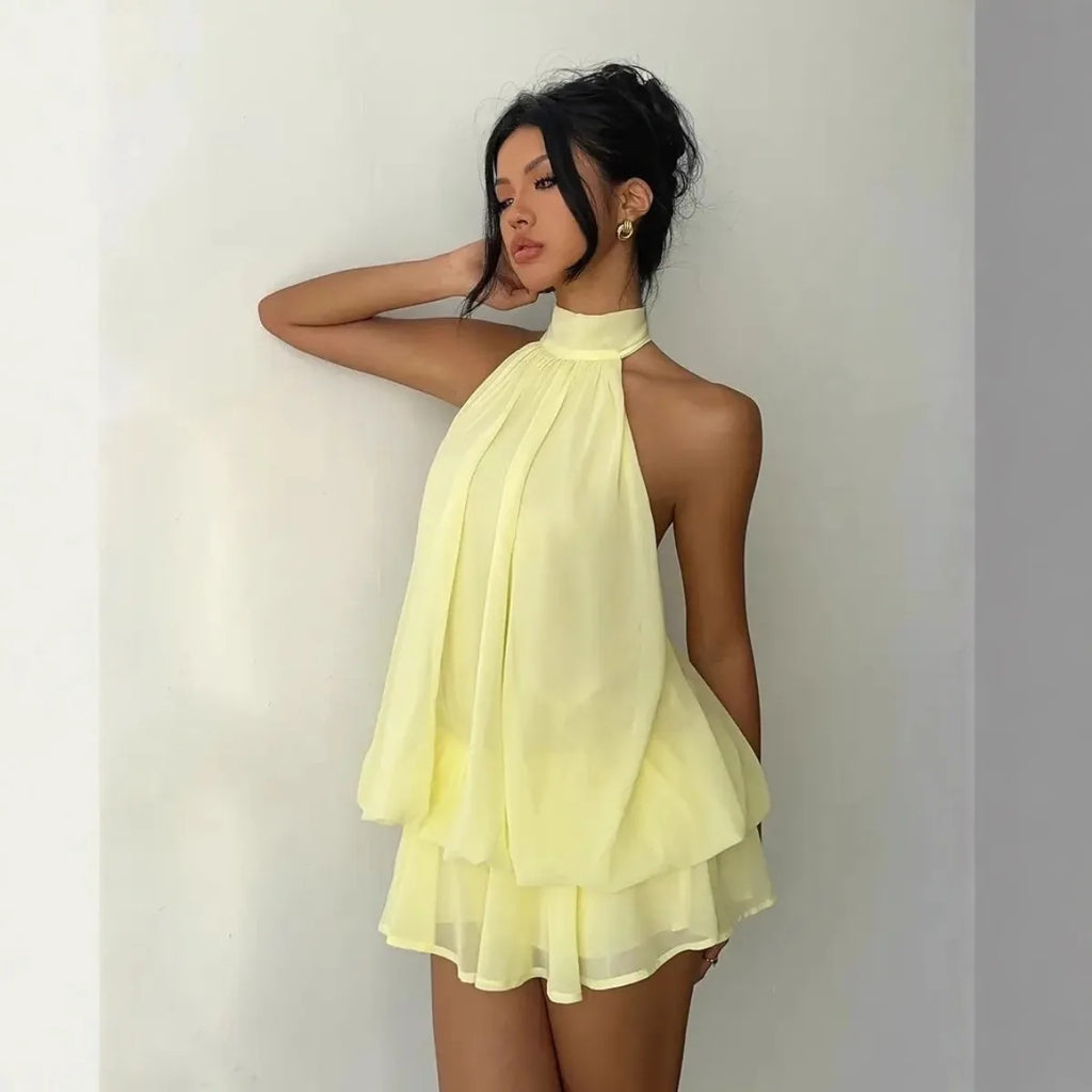 Abito da donna con collo all’americana, minigonna in chiffon senza schienale