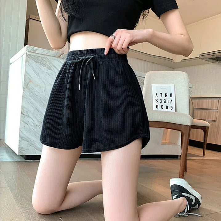 Pantaloncini da donna Abbigliamento esterno estivo a vita media casual