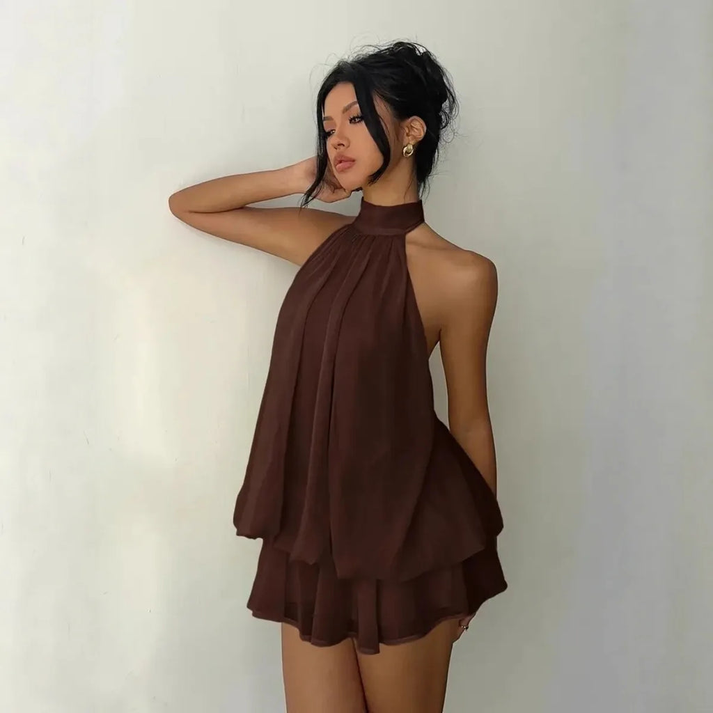 Abito da donna con collo all’americana, minigonna in chiffon senza schienale