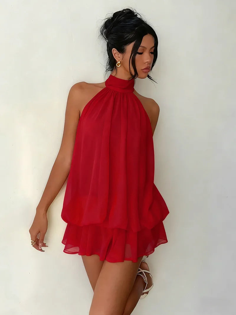 Abito da donna con collo all’americana, minigonna in chiffon senza schienale