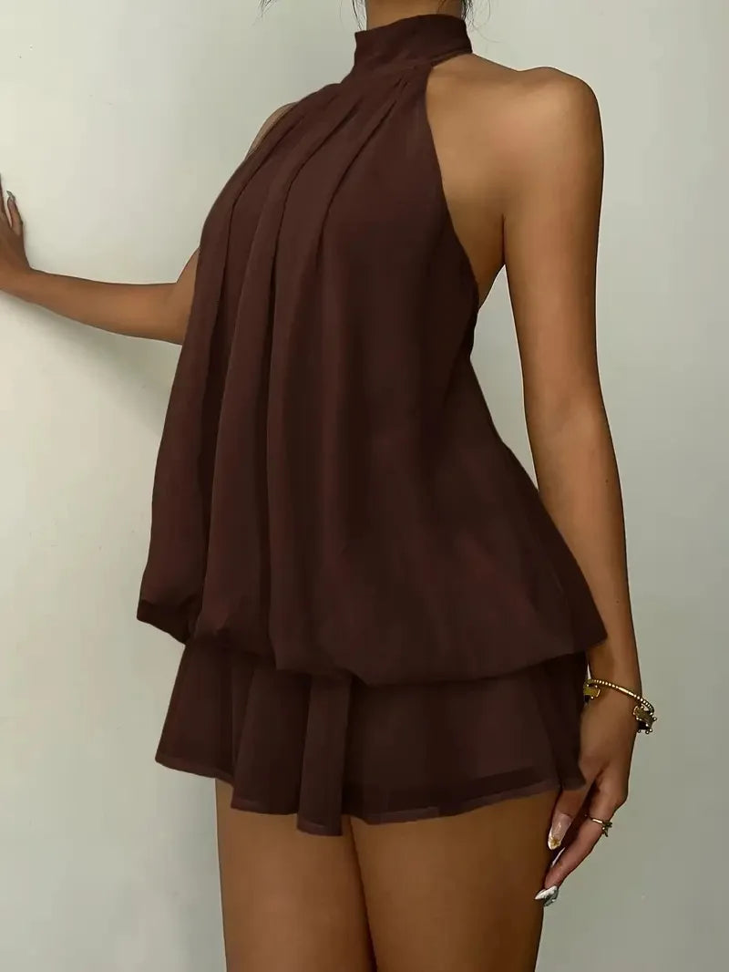 Abito da donna con collo all’americana, minigonna in chiffon senza schienale