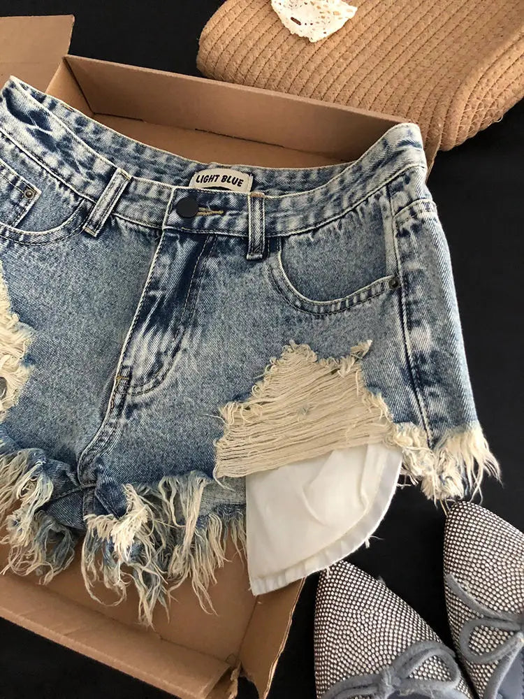 Pantaloncini di jeans strappati Tasche retrò da donna