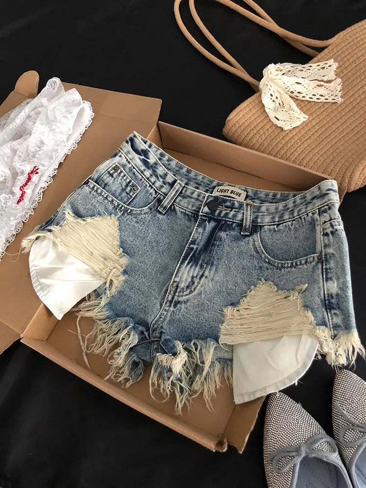Pantaloncini di jeans strappati Tasche retrò da donna