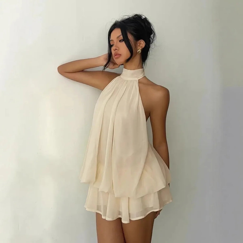 Abito da donna con collo all’americana, minigonna in chiffon senza schienale
