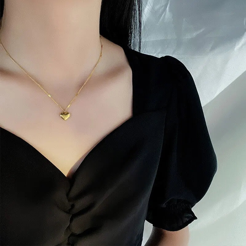 Collana color oro con cuoricino