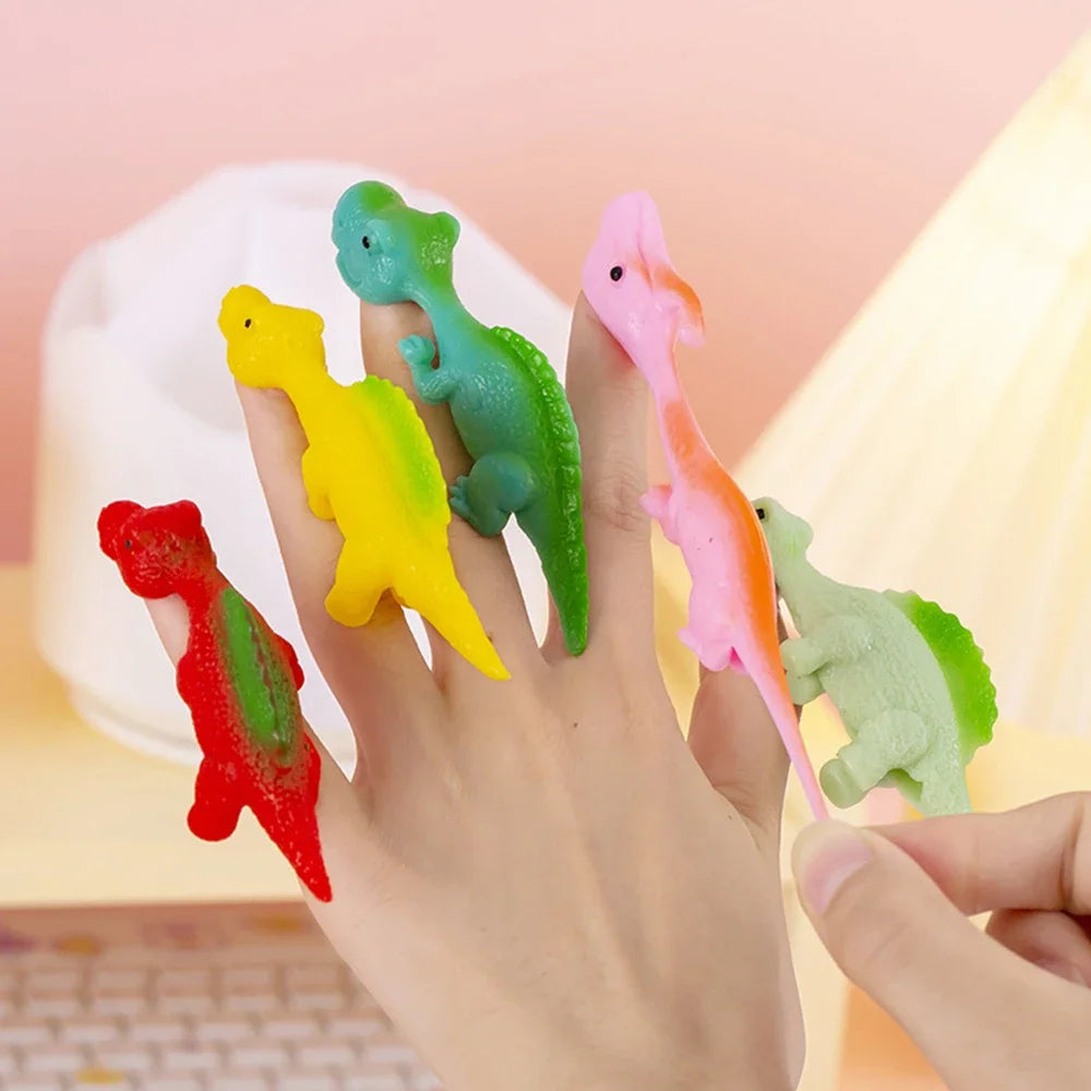 5-20Pcs Colorful Finger Catapult Dinosauro Giochi Bambini